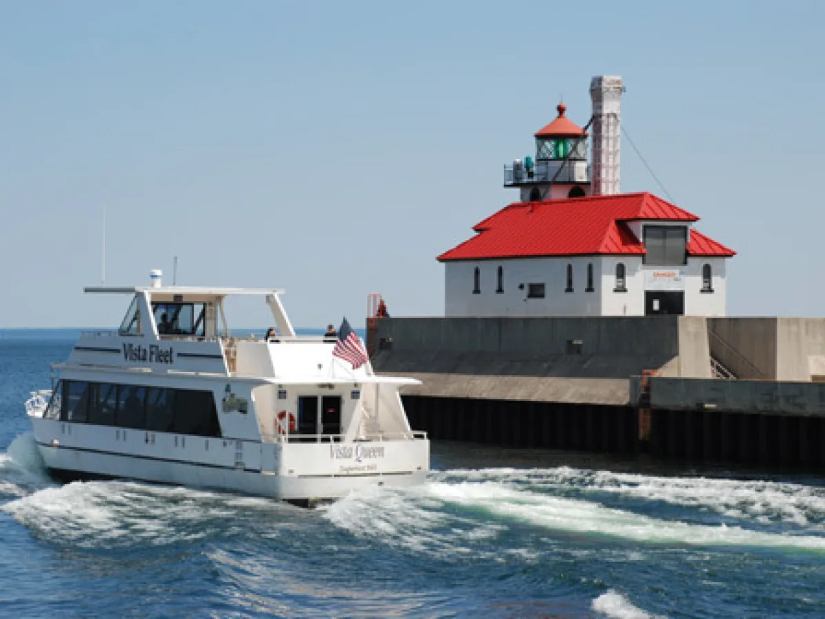 a small boat in a large body of water