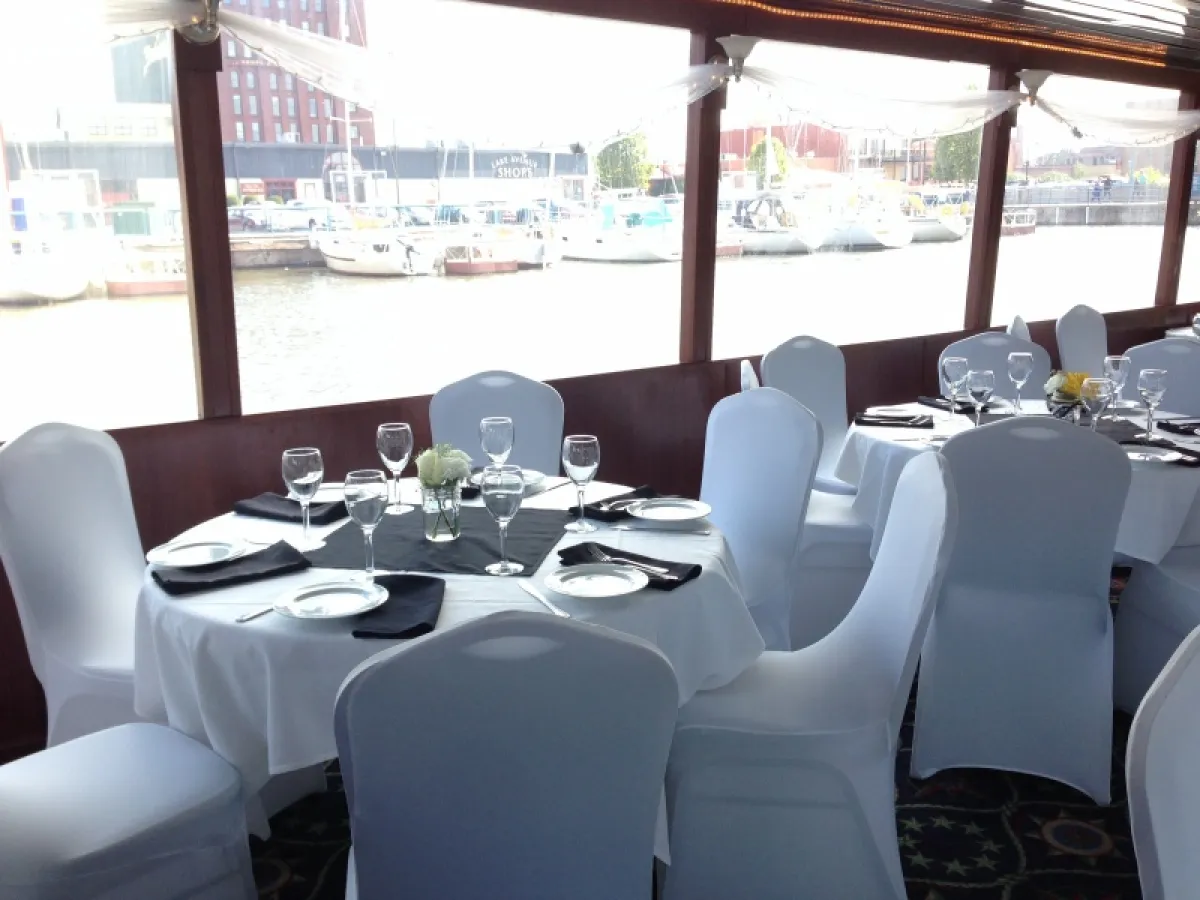 a room filled with furniture and a large window