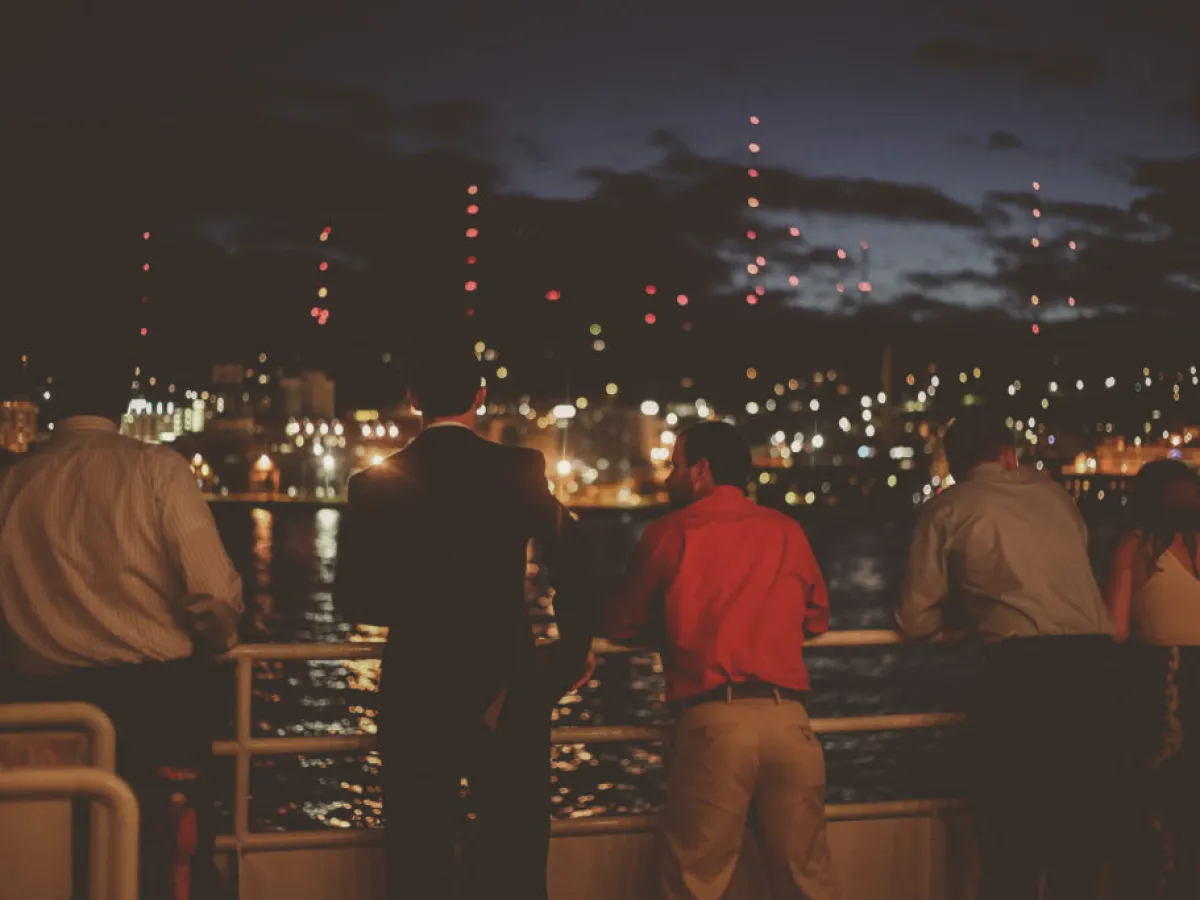 a group of people performing on stage in front of a crowd