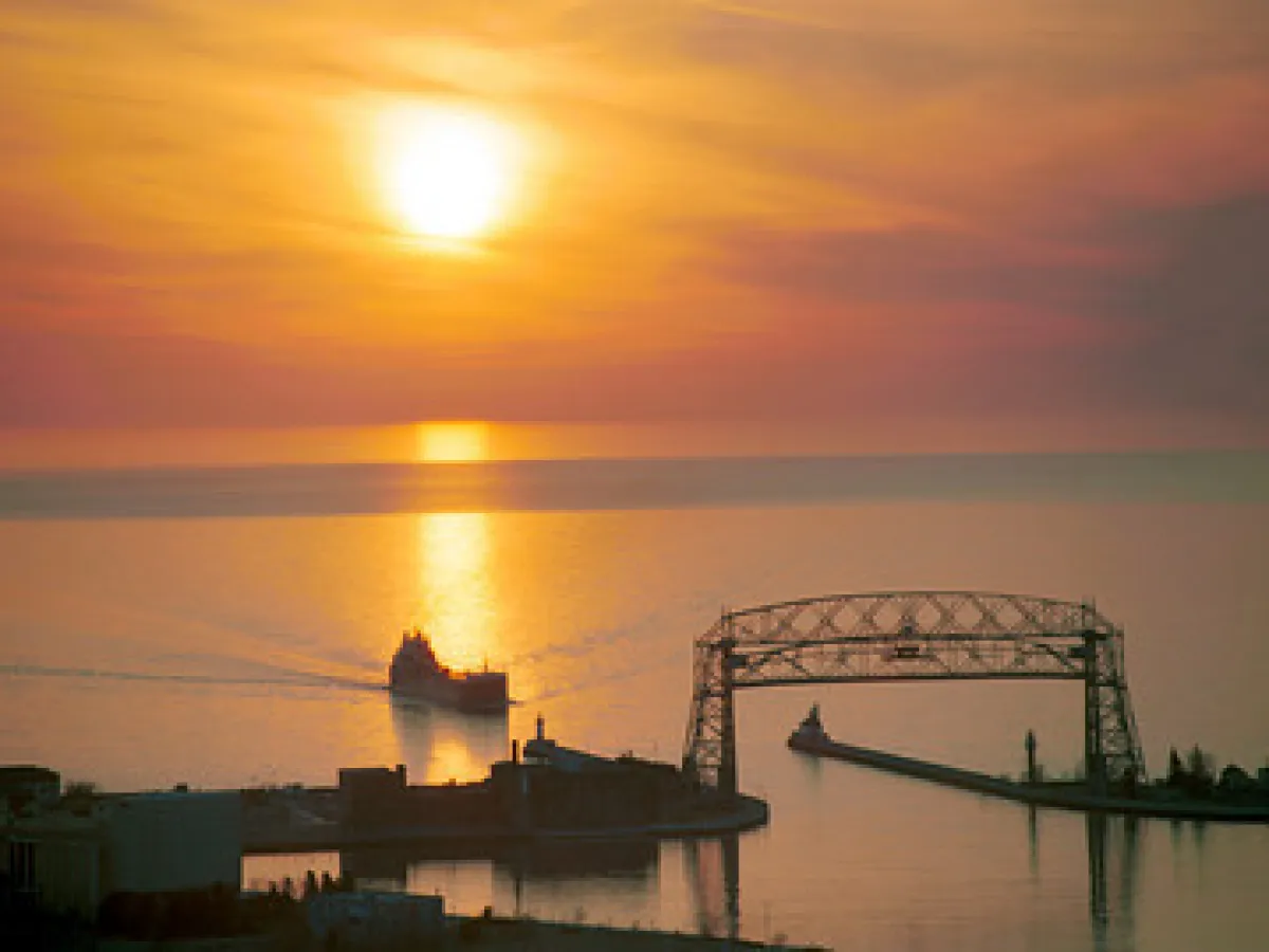 a sunset over a body of water