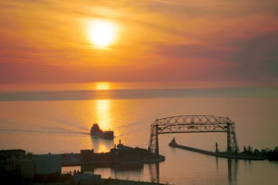 a sunset over a body of water