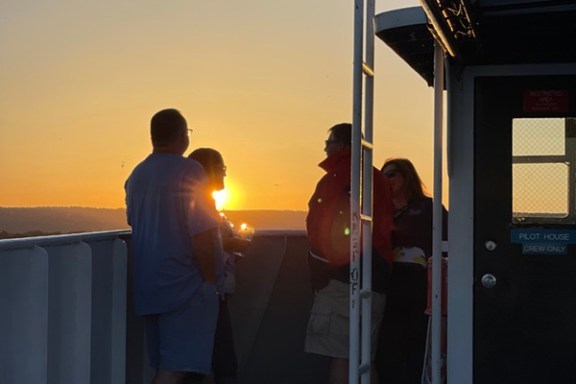 a man standing in front of a building