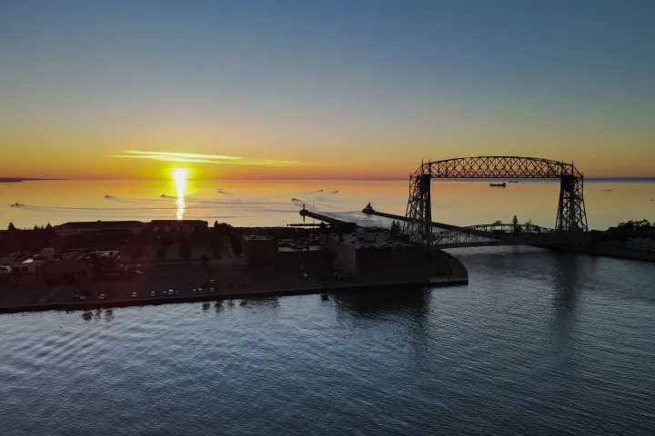 a sunset over a body of water