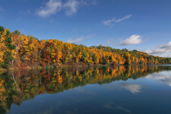 a view of a lake surrounded by a body of water