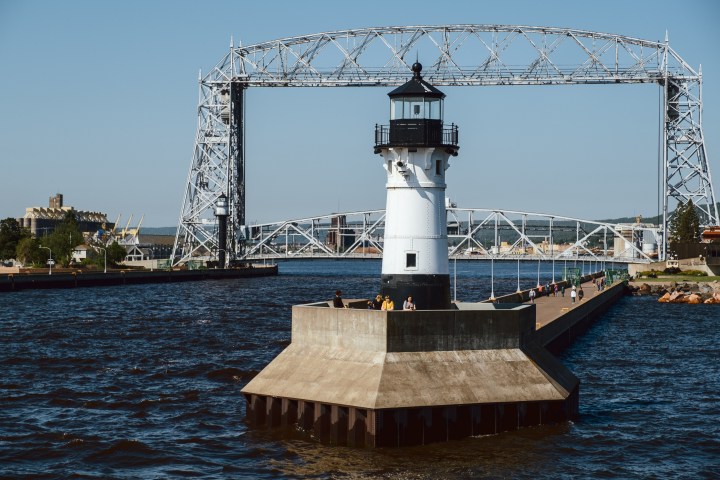 a close up of a bridge over a body of water