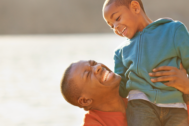 a person holding a baby