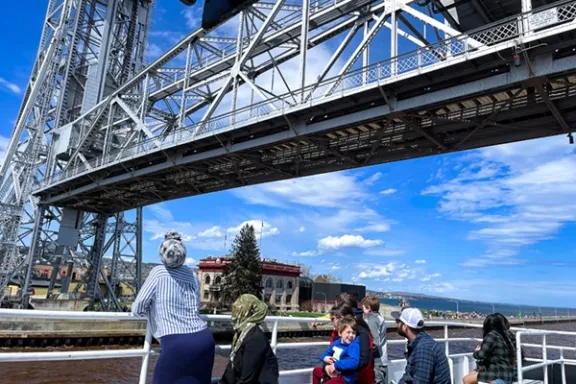 a group of people on a bridge