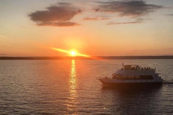 a sunset over a body of water