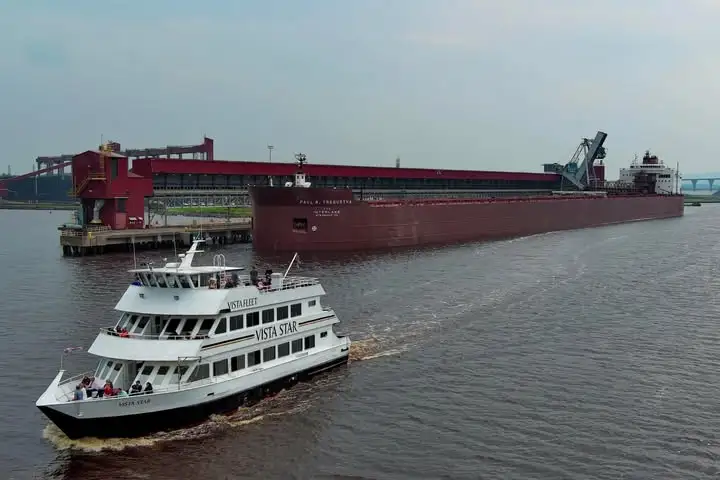 Vista Star passing a large freighter in Duluth, Minnesota