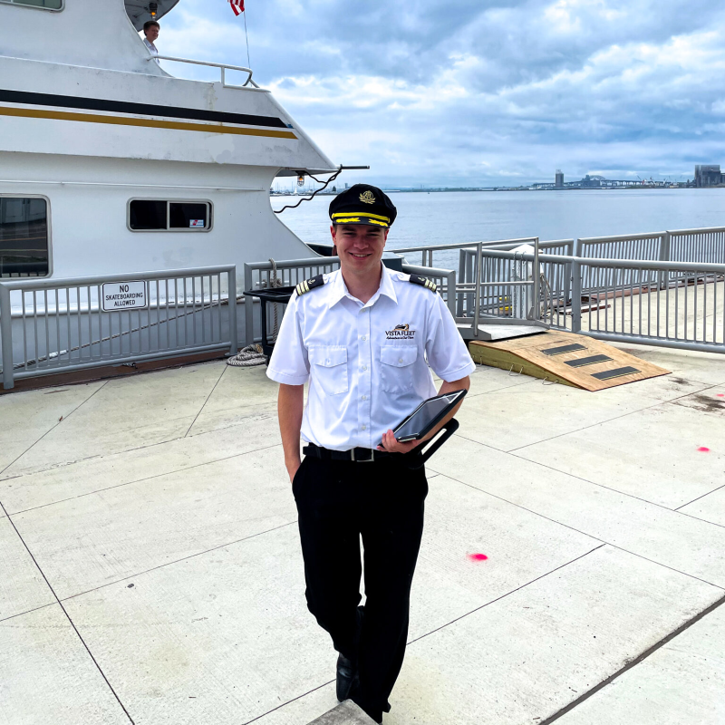 a man standing in front of a building
