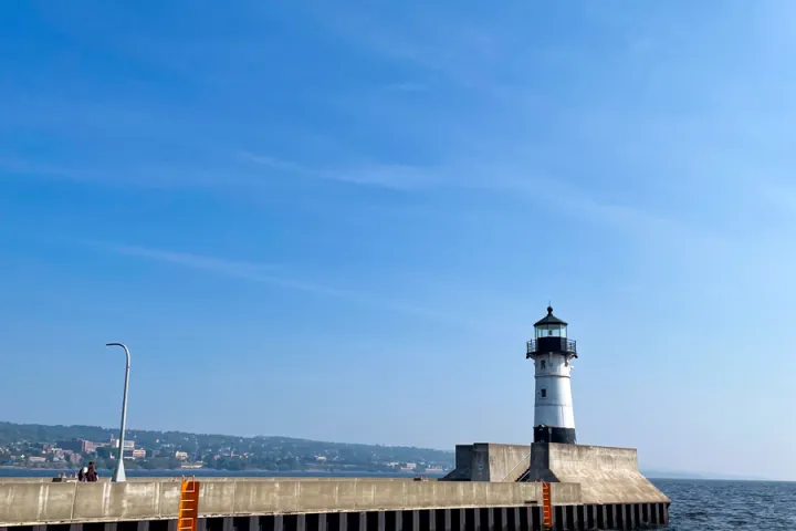view of a Lake Superior lighthouse in Duluth from a boat